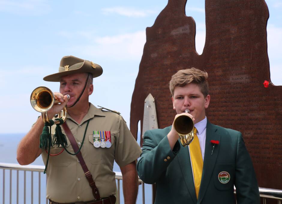 SUPPORT: Australian Army Band Newcastle Major David Thompson with Blaine Stubbs, 17, from Newcastle Bugle Corps at the Poppy Appeal launch on November 2. Pictures: Ellie-Marie Watts
