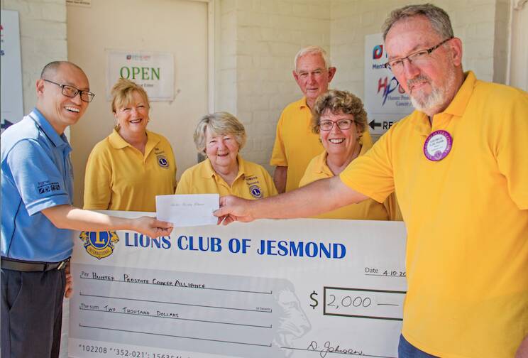 The cheque being presented to HPCAs CEO Cary Lee on October 4. Pictured left to right: Hunter Prostate Cancer Alliance CEO Cary Lee, Jesmond Lions Club members Deb Johnson, Rhonda Golder, Brian Bow, Trish Bow and general manager George Webb.