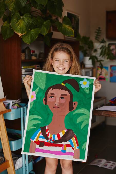 GENEROUS: Honor Adams, 9, from Cardiff, with her painting of her family's Indonesian sponsor child, Pretty.