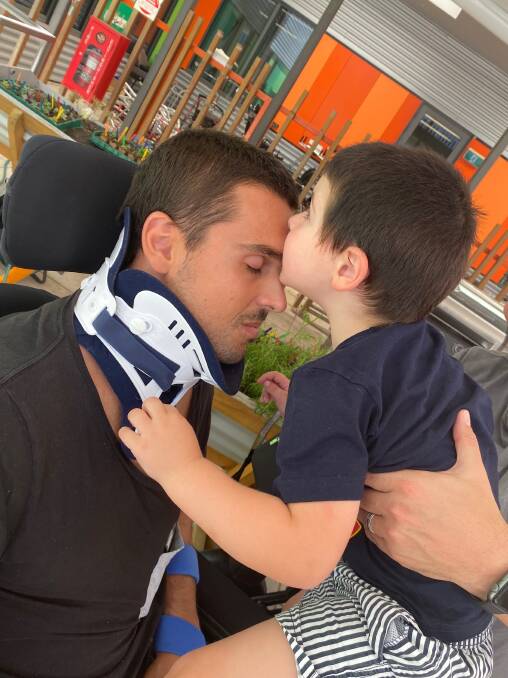 JOURNEY AHEAD: Chris Poulos, from Belmont North, with his son Hunter at Royal North Shore Hospital. Picture: Supplied