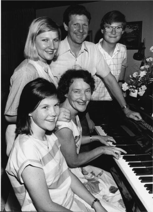 Margaret McNaughton, with husband John, and their children, Meg (front), Anne, and Chris at home in 1985. 