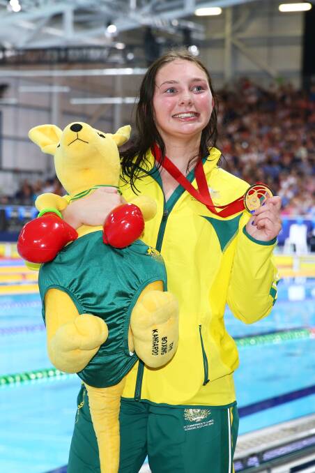 Gold medallist Maddison Elliott  celebrates after winning the Women's 100m Freestyle S8 Final in a new world record time of 1:05.32 seconds. Photo: Getty Images.