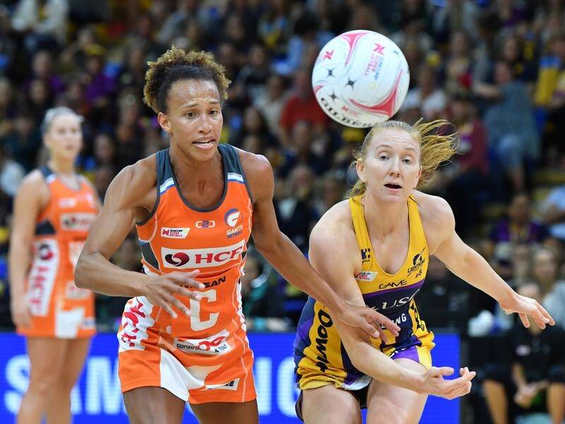 Giants' Serena Guthrie and Sunshine Coast Lightning's Maddy McAuliffe in 2018 Super Netball action.