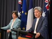 Catherine Colonna (left) headed a review into an aid agency that has been welcomed by Penny Wong. (Mick Tsikas/AAP PHOTOS)