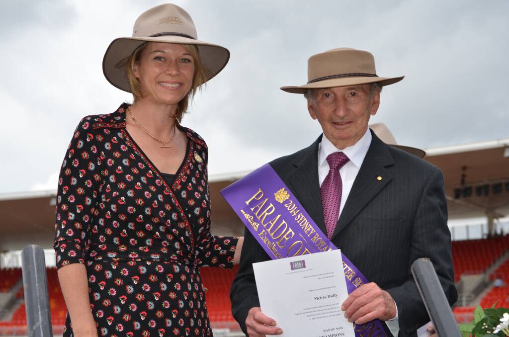NSW Minister for Primary Industries Katrina Hodgkinson with Swansea resident Melvin Duffy, who was part of the Sydney Royal Easter Show's Parade of Champions 2014.