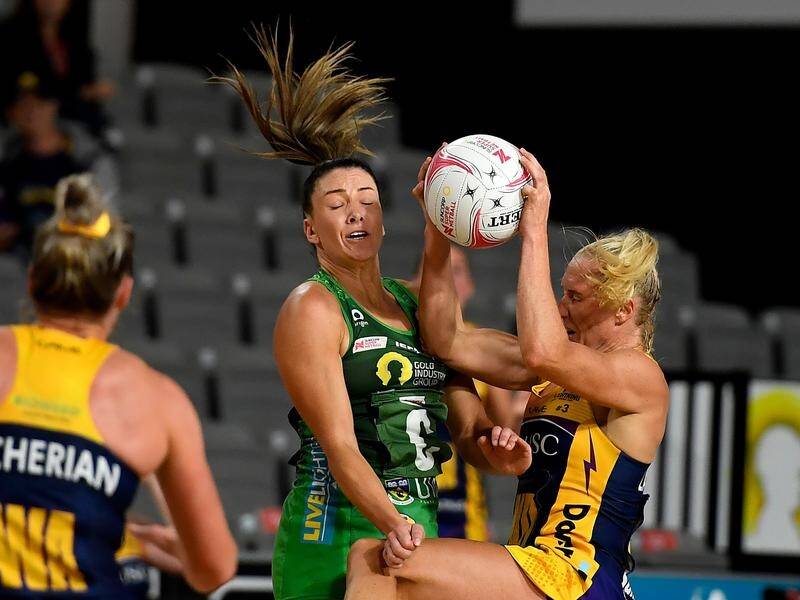 The Fever's Verity Charles and Laura Langman of the Lightning fight for the ball in Tuesday's clash.