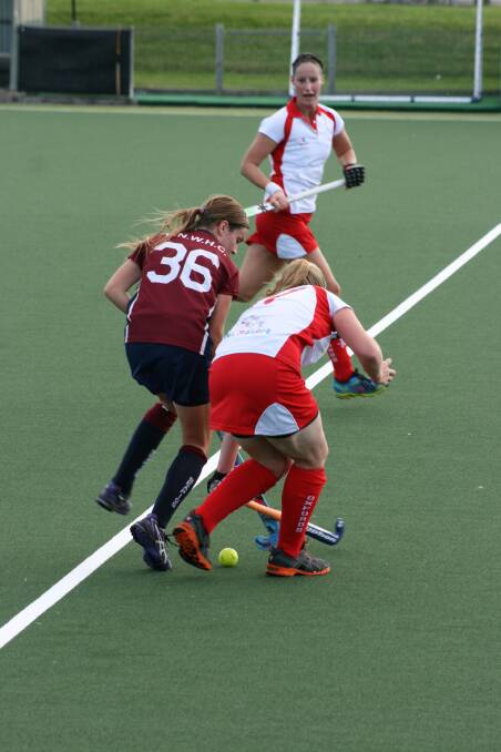 GET THE BALL: Brady defends against Oxford Hockey Club in  the Newcastle hockey competition in May.