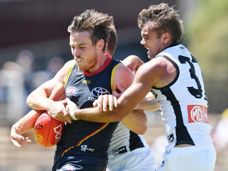 Adelaide Crow Paul Seedsman (l) is hoping for more attacking football when the AFL returns.