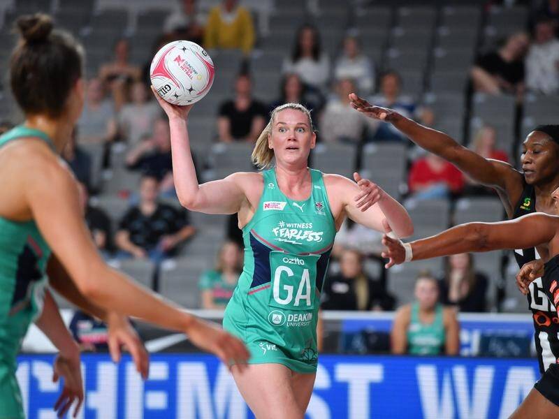 The Melbourne Vixens have clinched the Super Netball minor premiership after beating Collingwood.