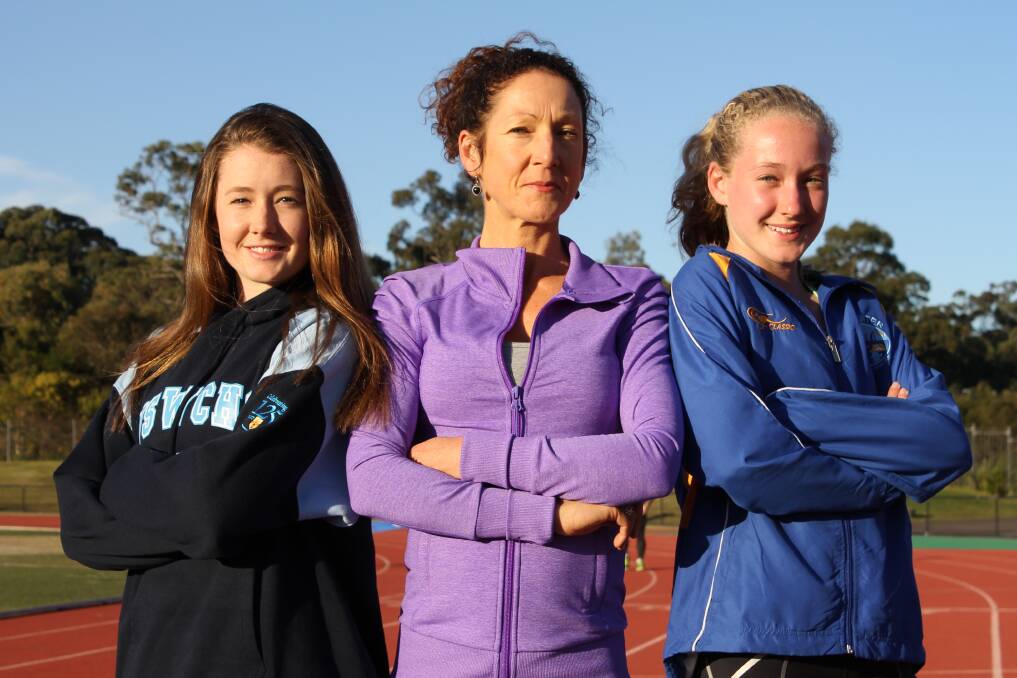 CAPTION: Emily and Mia Nash hit the track at with their mum Clare.