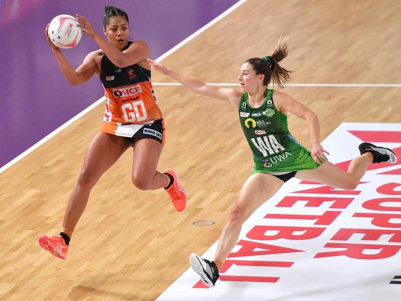 Giants' Kristiana Manu'a (left) this week became the first Super Netballer ever to be off.