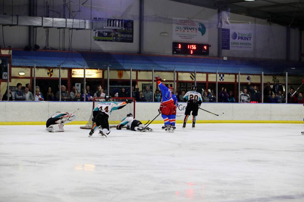 NICE ONE: Adam Geric scores the Newcastle North Stars' fourth goal in Sunday's match against the Sydney Ice Dogs.