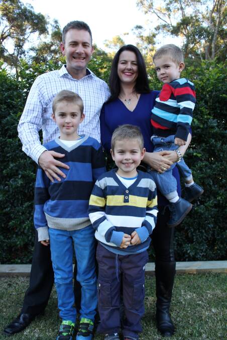 HAPPY FIVE: Simon Watson with his wife Trudy and children Kai (2), Ashton (9) and Callum (5) at their home in Newcastle.