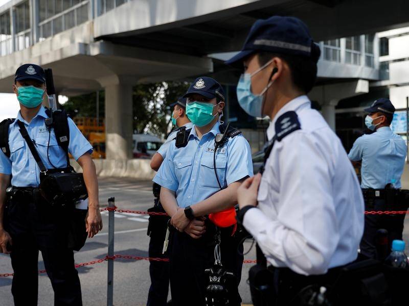 Hong Kong will put everyone entering the city from midnight Thursday in quarantine for 14 days.