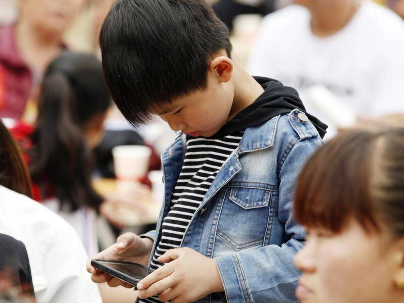 Up to 30 per cent of children and young people use phones in a dysfunctional way, researchers say.