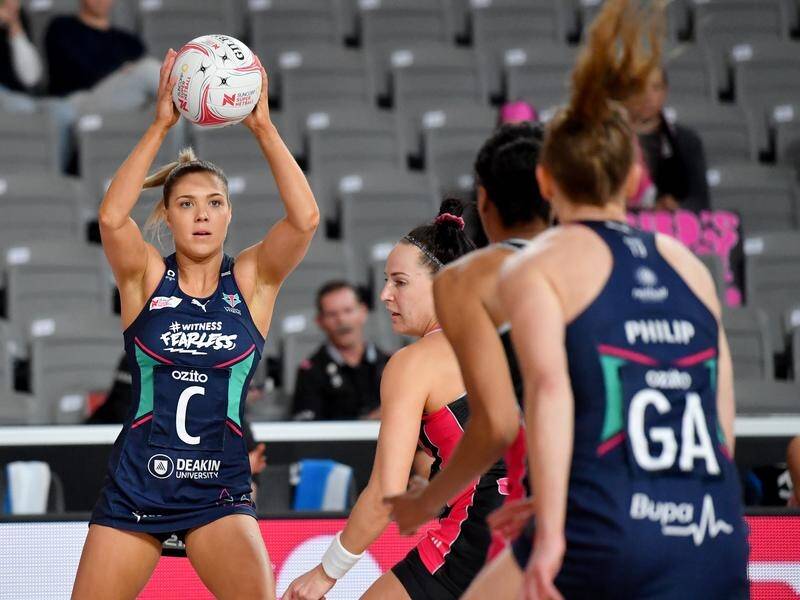 Kate Moloney (l) was one of Melbourne Vixens' dominant midcourters against Adelaide Thunderbirds.