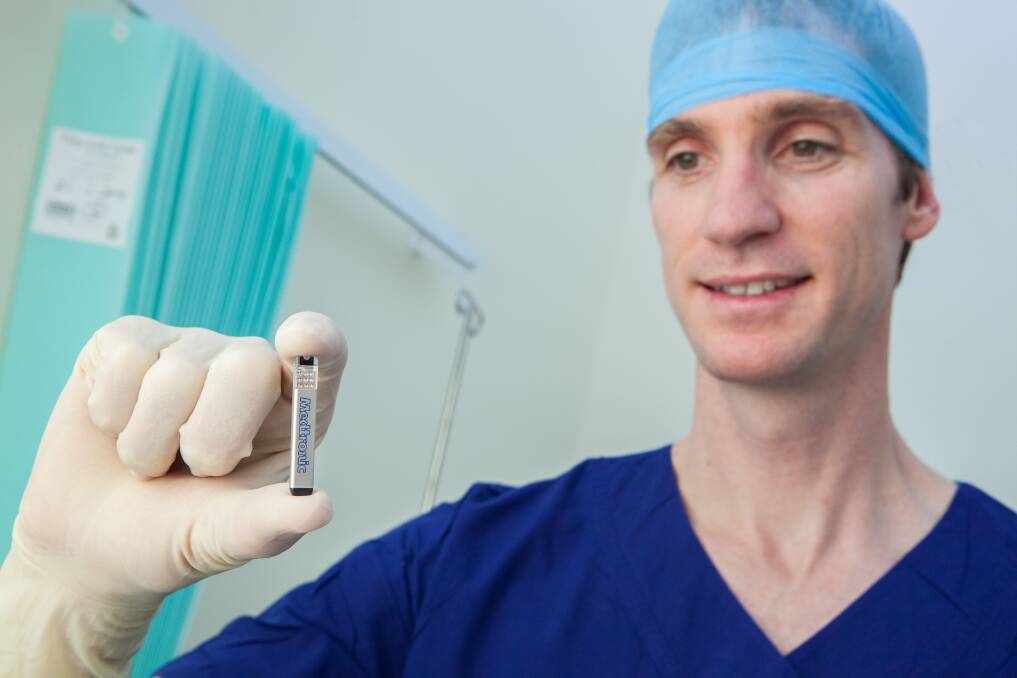 LIFE SAVER: Dr Brad Wilsmore with the world’s smallest cardiac monitor, which he recently implanted.