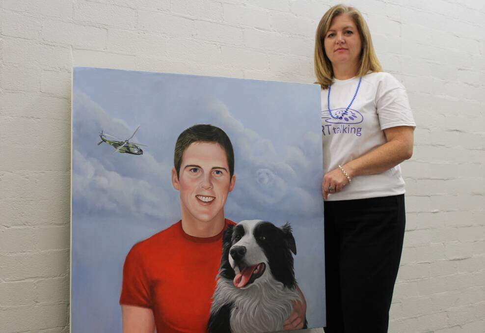 KEY PARTS: Morpeth artist Kathie Bowtell with her painting of Kallan, one of 10 to feature in her portraiture series stART Talking.