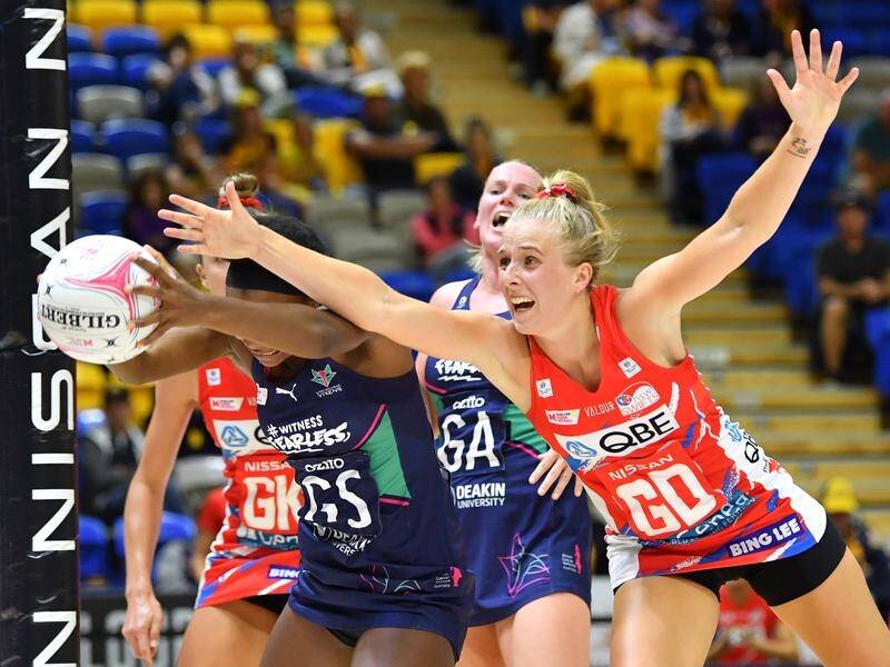 Maddy Turner (r) says the NSW Swifts must regain form to be a Super Netball finals force.