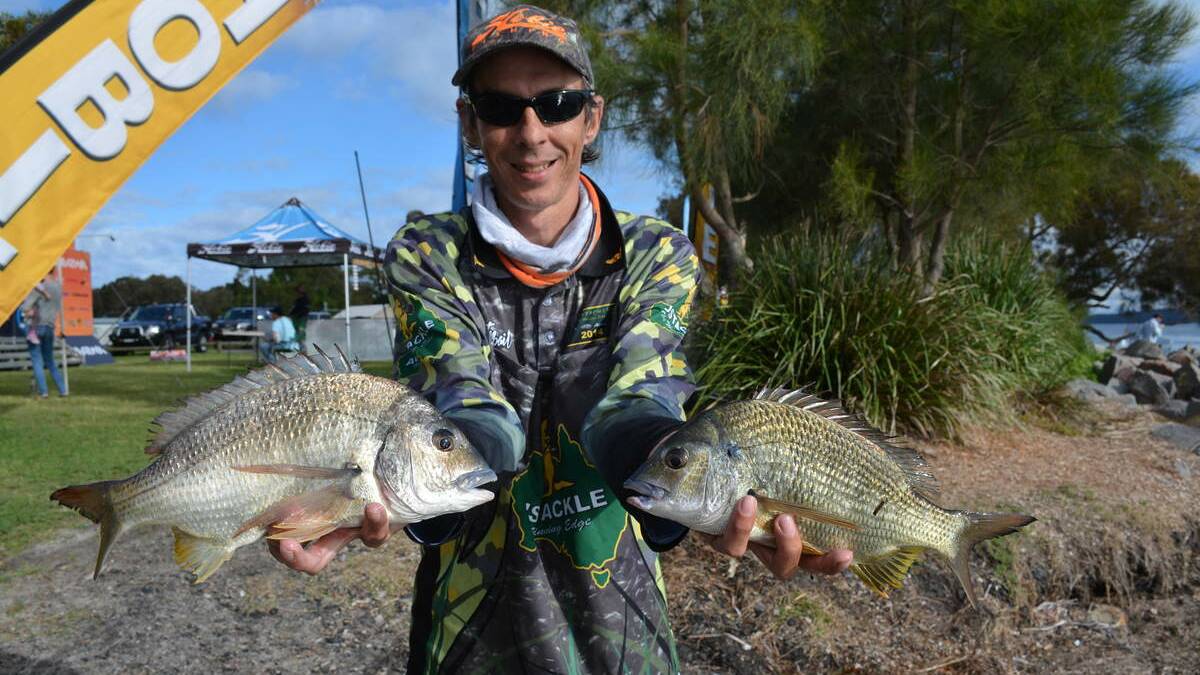 2014 Hobie Kayak Bream Series, round 8 in Lake Macquarie. Ronnie Sonter holds his catch.