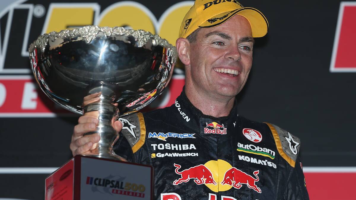 Craig Lowndes, driver of the #888 Red Bull Racing Australia Holden, celebrates after winning race two of the V8 Supercars Championship  at the Clipsal 500. Picture: Getty