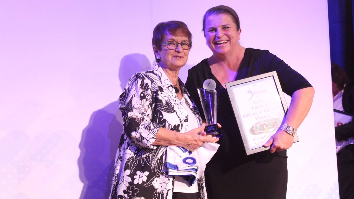 TOP SPOT: SNSW president Frances Crampton presents NDSA association president Rebecca Jenkins with the top gong at the state awards.