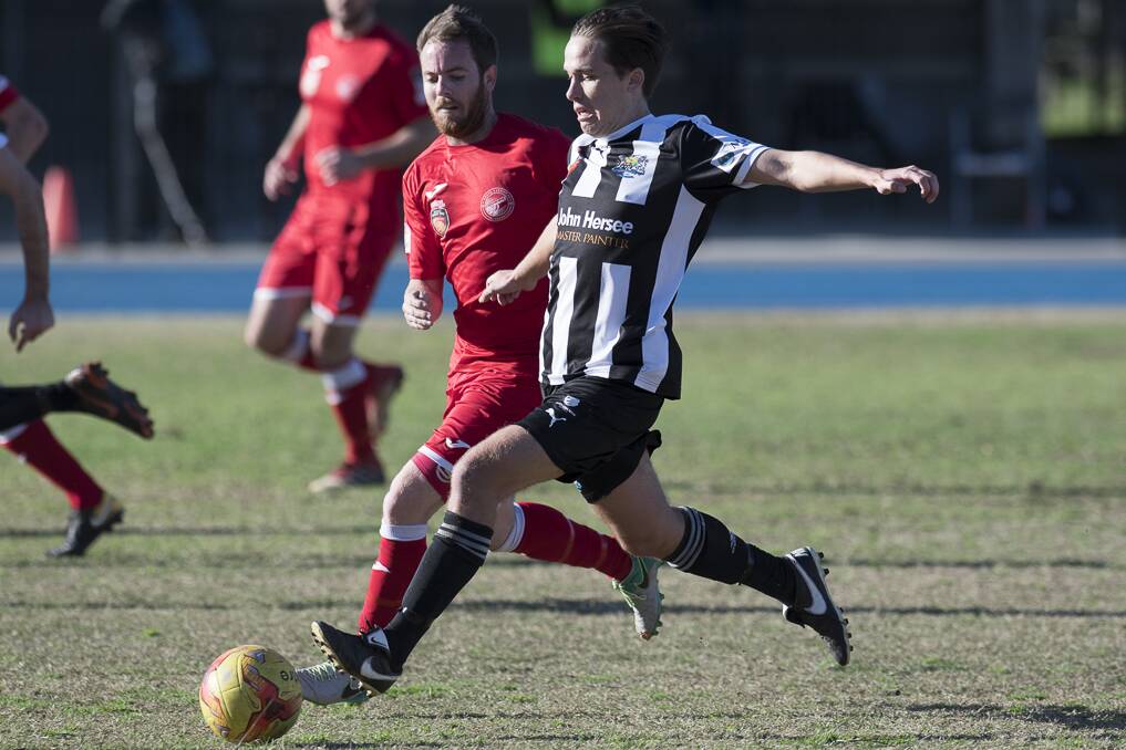 South Cardiff and Cooks Hill battled their way to a 2-all draw at the Newcastle Athletics Field, the first time a club hasn't tasted a second defeat against the league leaders this season. Picture: Hunter Sports Photography