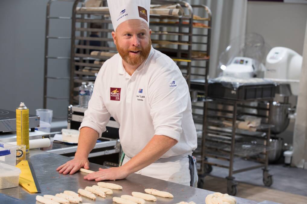 MASTER CHEF: Dean Tilden, a teacher at TAFE Hamilton, has put Newcastle's baking talents on the world map with third place glory in Paris. Picture: Clémentine Bejat