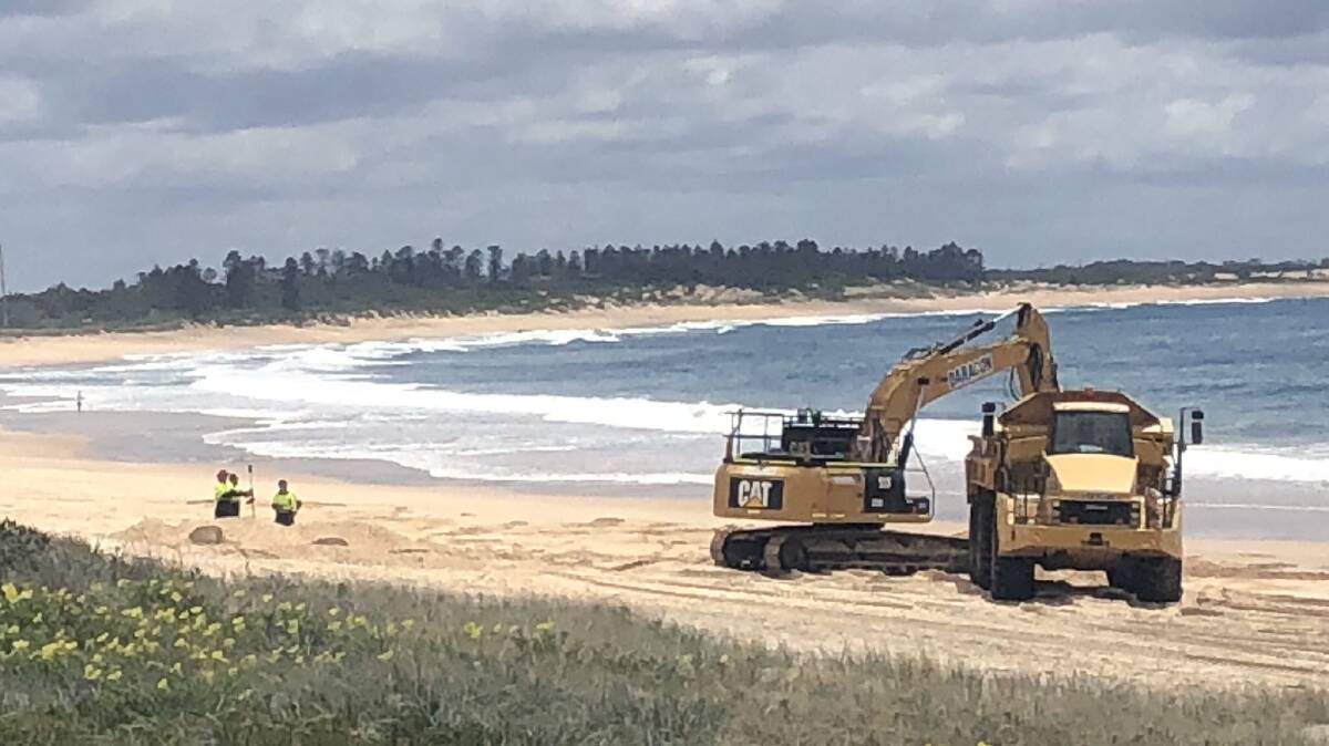 MITIGATION: Newcastle City Council have begun work to scrape sand between the Stockton Surf Life Saving CLub and the northern end of the Mitchell Street seawall. Picture: supplied.