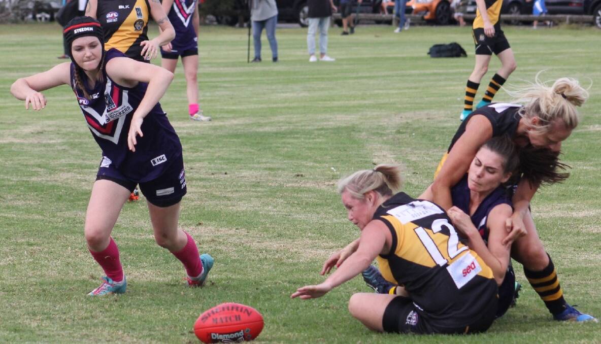 Ange Jones and Rhiannon Medcraft combined for a massive 17-goal tally as the Dockers were run over by the Gosford Tigers.