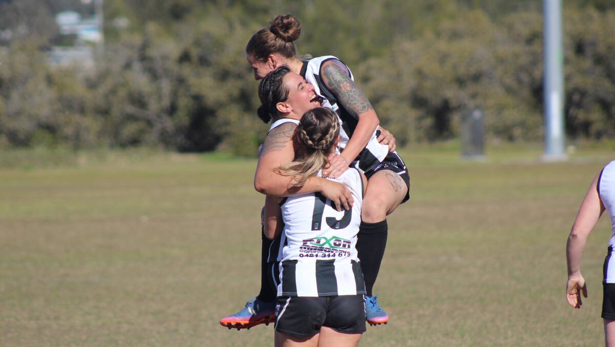 The Magpies celebrate Monique Maddalena's goal which put them ahead of their regional rivals. Picture: Isaac McIntyre