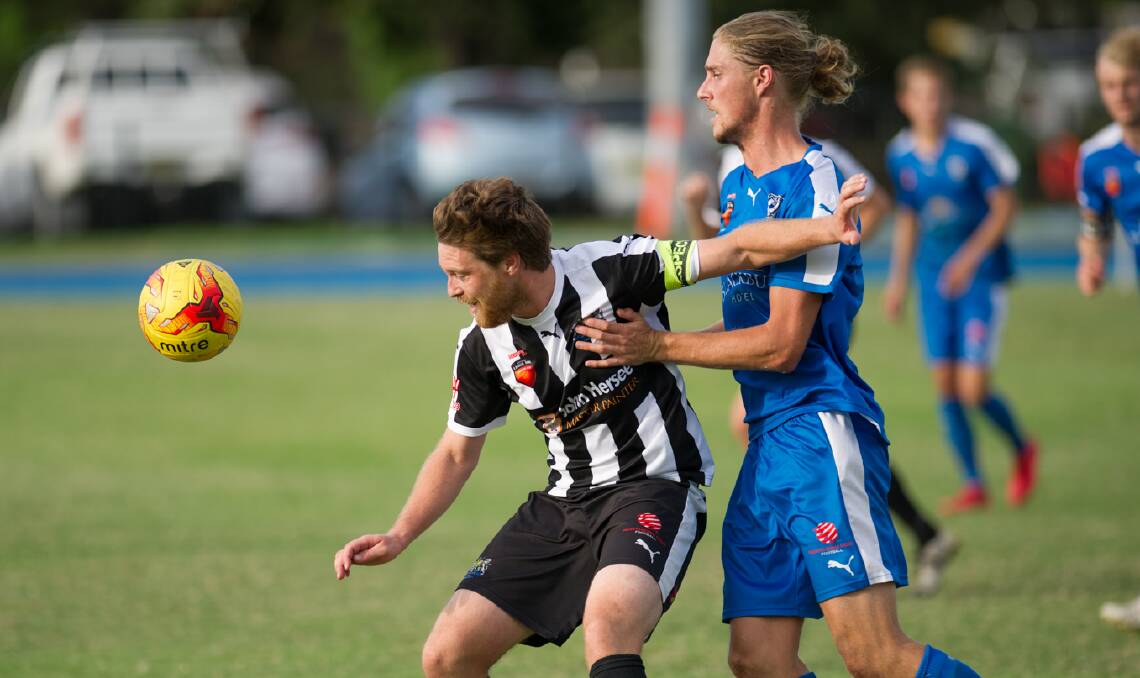 BATTLE: Cooks Hill held off a challenging New Lambton to keep hold of the top of the table in the Northern League One. Picture: Hunter Sports Photography