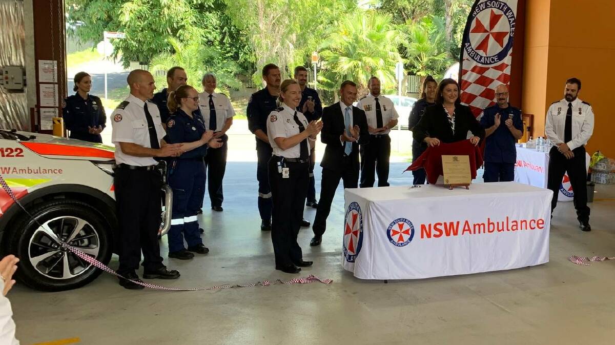 NSW Ambulance staff gather as the plaque is unveiled at Birmingham Gardens on Tuesday.