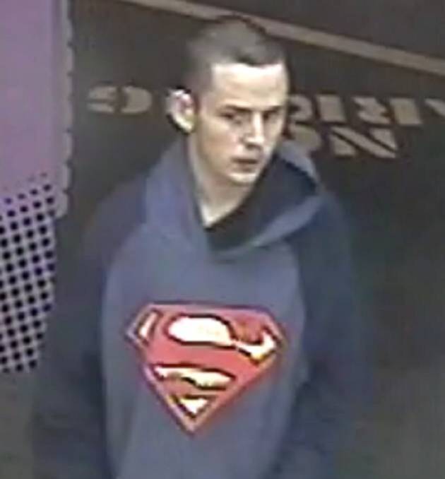 GUILTY: Samuel Barnes enters a service station in his distinctive blue hooded jumper with a red and yellow Superman motif on the front. 