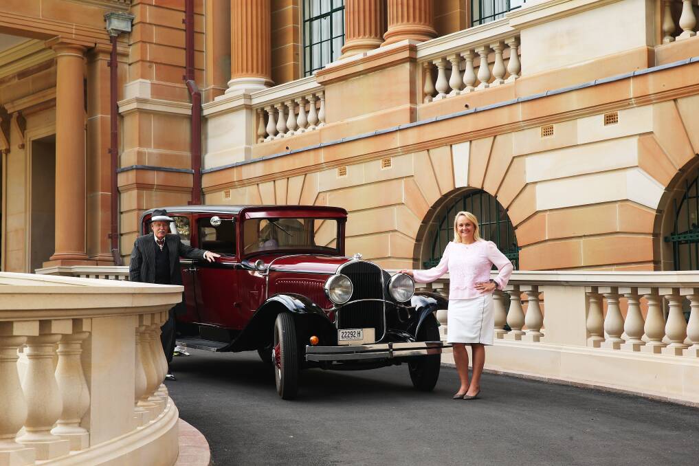 REVAMP: Lord Mayor Nuatali Nelmes with Laurie Baker and his 1929 Chrysler outside City Hall.