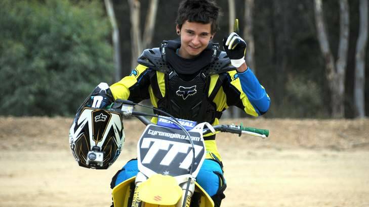 Tyronne Gilks, then aged 16, breaks 125cc motorcycle jump. Photo: Kate Leith