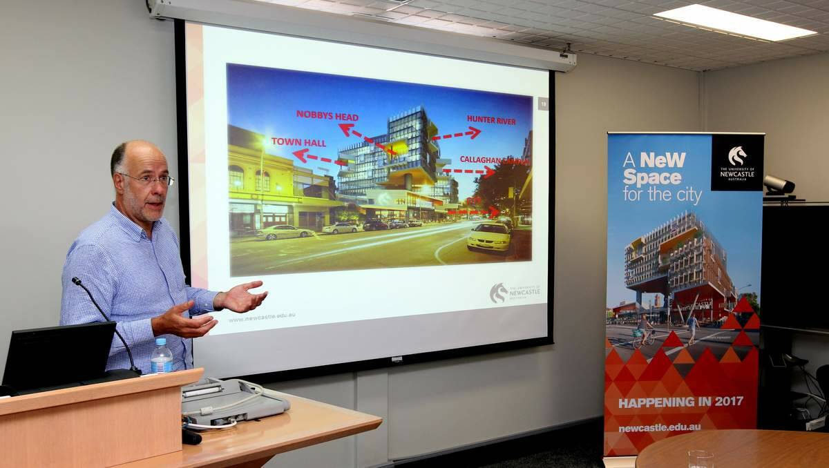 VISIONS:  Architect Carey Lyon with an artist’s impression of the city campus for Newcastle university.