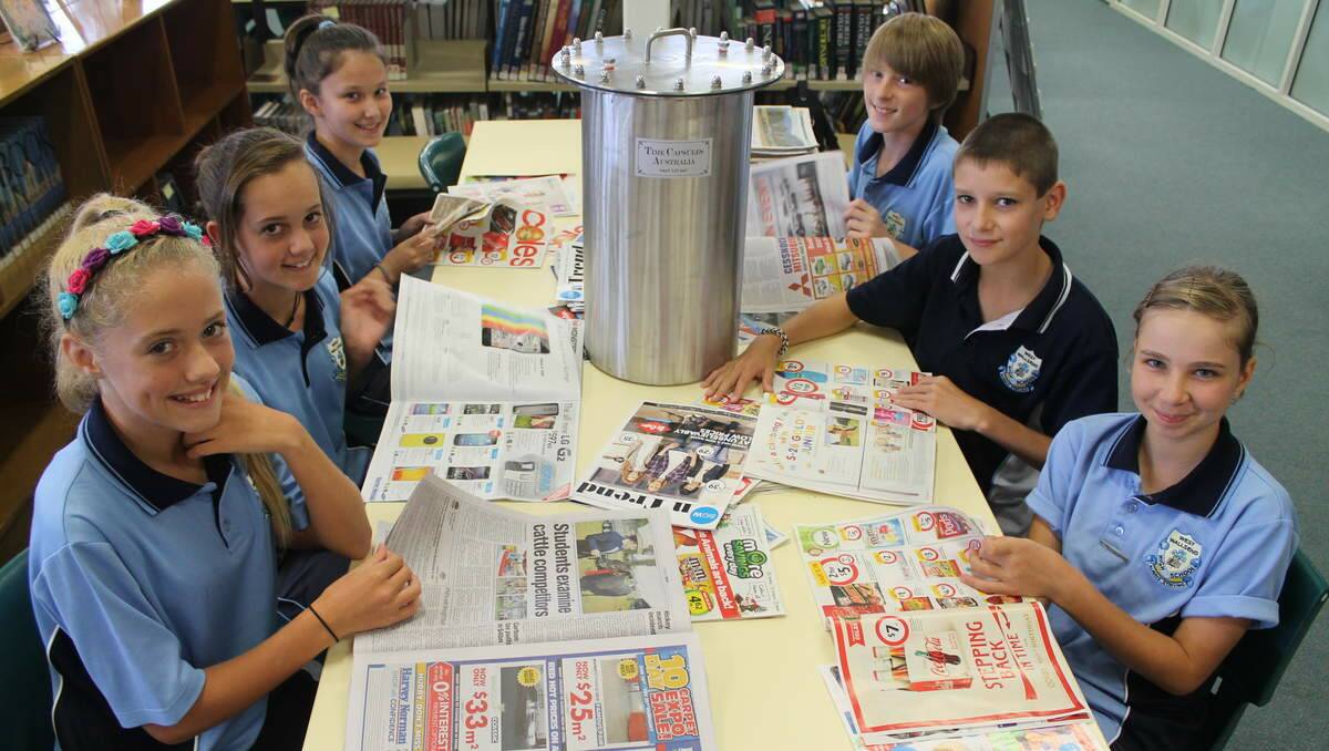 CURRENT: West Wallsend High School year seven students research material to place in the time capsule.