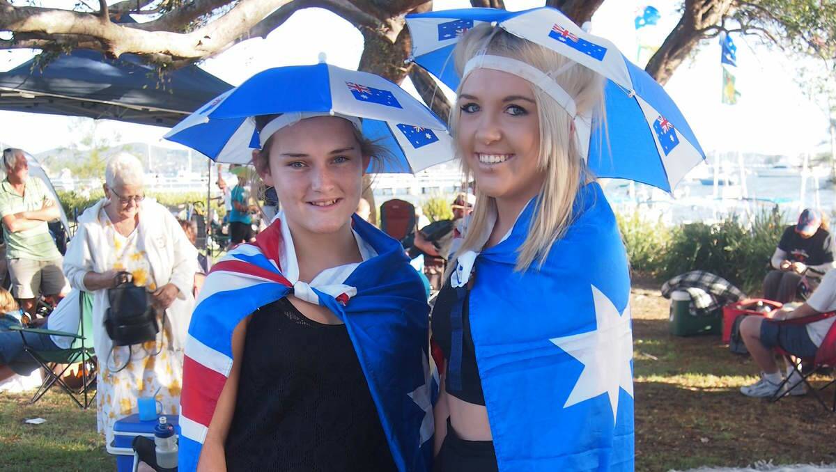 Pretty in blue Kayla Smith, 13, Edgeworth, and sister Alyssa, 16, at the Lake Macquarie Festival, Speers Point on Australia Day.