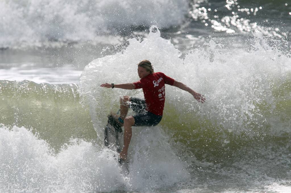 James McMoreland surfing at thethe Orica Tag Team Challenge . Picture: Grant Sproule
