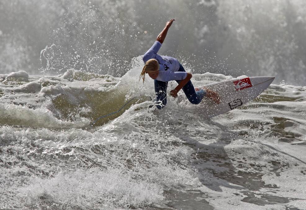 Luke Hamitlon surfing at the Orica Tag Team Challenge . Picture: Grant Sproule